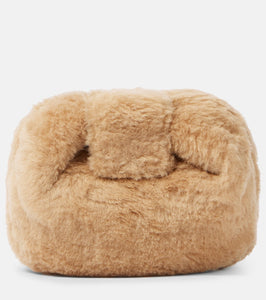 Gabriela Hearst Soft Demi faux shearling clutch. Shop Gabriela Hearst Clutches for women now.