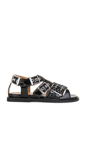 Ganni Feminine Buckle Sandal in Black | Black Flat Sandals for Women