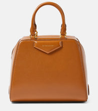 Givenchy Antigona Cube Mini leather tote bag. Shop Givenchy Top-Handle Bags for women now.