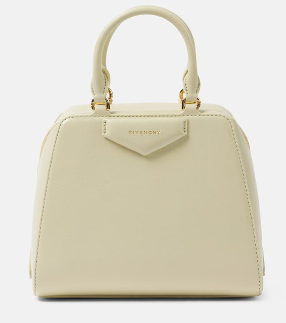 Givenchy Antigona Cube Mini leather tote bag. Shop Givenchy Top-Handle Bags for women now.