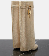 Givenchy Shark Lock embellished knee-high boots