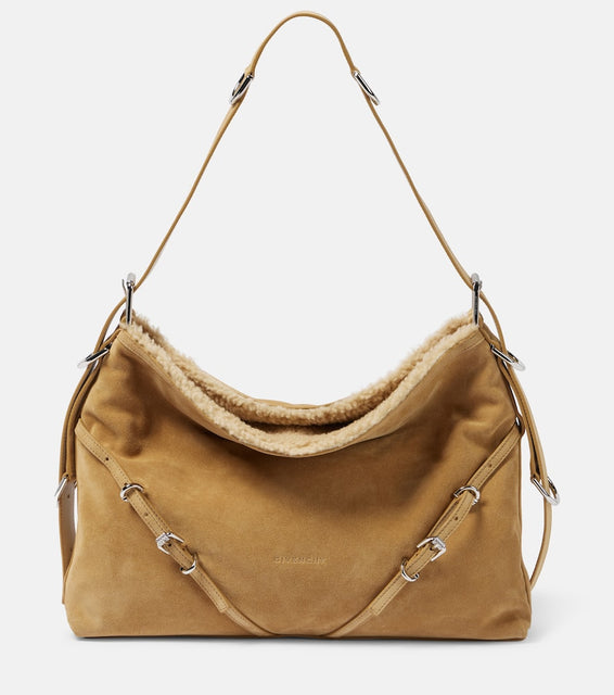 Givenchy Voyou Medium suede and shearling shoulder bag. Shop Givenchy Shoulder Bags for women now.