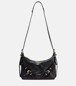 Givenchy Voyou Mini leather shoulder bag. Shop Givenchy Shoulder Bags for women now.