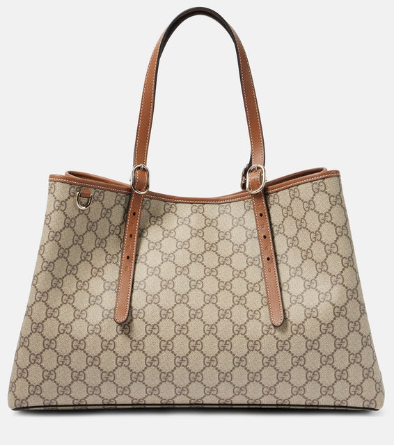 Gucci GG Canvas Medium tote bag. Shop Gucci Tote Bags for women now.