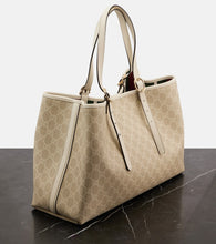 Gucci GG Emblem Medium leather-trimmed tote bag