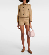 Gucci GG Emblem Mini leather-trimmed bucket bag