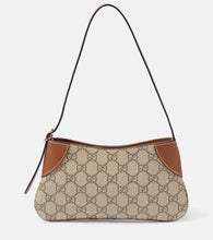 Gucci GG Emblem Super Mini shoulder bag. Shop Gucci Shoulder Bags for women now.