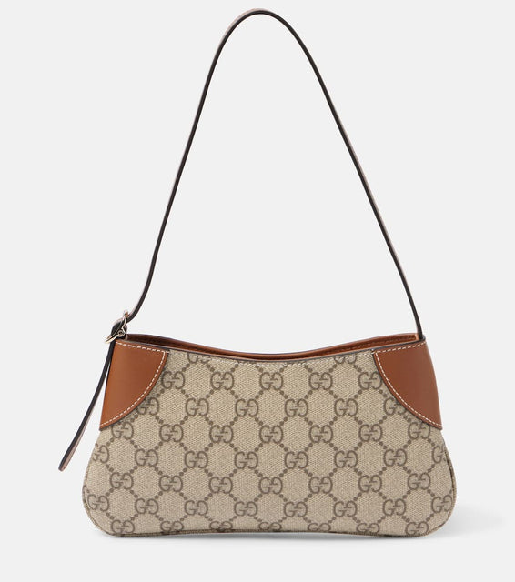 Gucci GG Emblem Super Mini shoulder bag. Shop Gucci Shoulder Bags for women now.