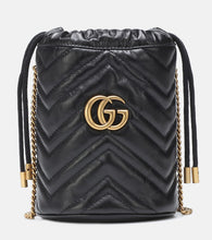 Gucci GG Marmont Mini leather bucket bag. Shop Gucci Bucket Bags for women now.