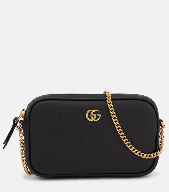 Gucci GG Marmont Mini leather shoulder bag. Shop Gucci Shoulder Bags for women now.