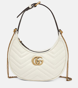 Gucci GG Marmont Mini leather shoulder bag. Shop Gucci Shoulder Bags for women now.