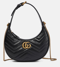 Gucci GG Marmont Mini shoulder bag. Shop Gucci Shoulder Bags for women now.