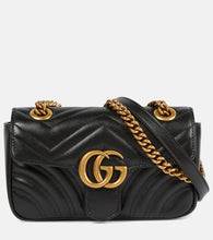Gucci GG Marmont Mini shoulder bag. Shop Gucci Shoulder Bags for women now.