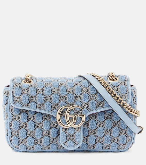 Gucci GG Marmont Small boucl√É¬© shoulder bag. Shop Gucci Shoulder Bags for women now.