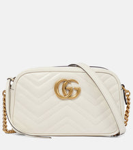 Gucci GG Marmont Small shoulder bag. Shop Gucci Shoulder Bags for women now.