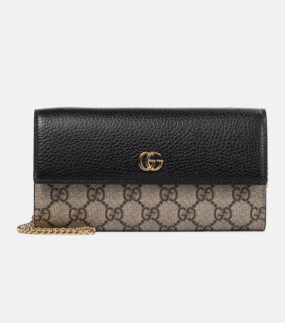 Gucci GG Marmont leather clutch. Shop Gucci Shoulder Bags for women now.