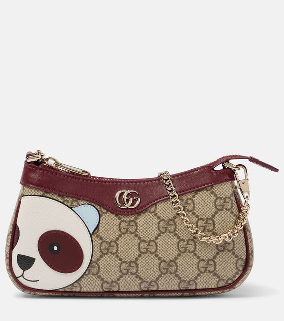 Gucci GG Mini panda-appliqu√É¬© shoulder bag. Shop Gucci Shoulder Bags for women now.