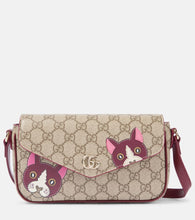 Gucci GG Mini printed shoulder bag. Shop Gucci Crossbody Bags for women now.