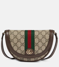 Gucci GG Supreme shoulder bag. Shop Gucci Shoulder Bags for women now.