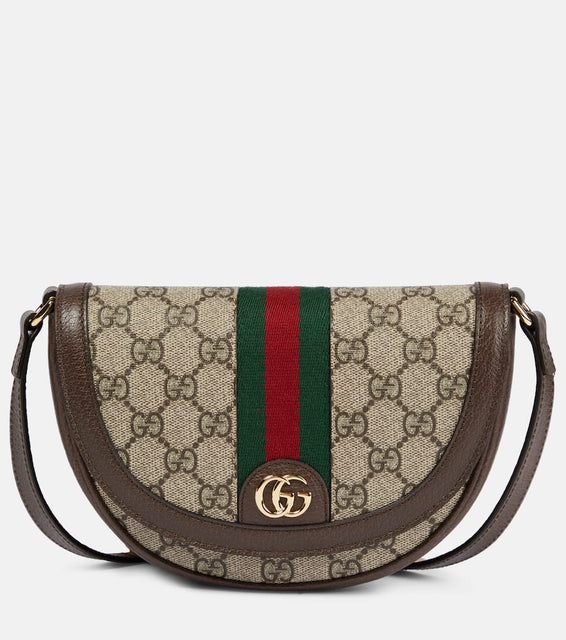 Gucci GG Supreme shoulder bag. Shop Gucci Shoulder Bags for women now.