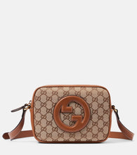Gucci Gucci Blondie GG Canvas Mini shoulder bag. Shop Gucci Crossbody Bags for women now.