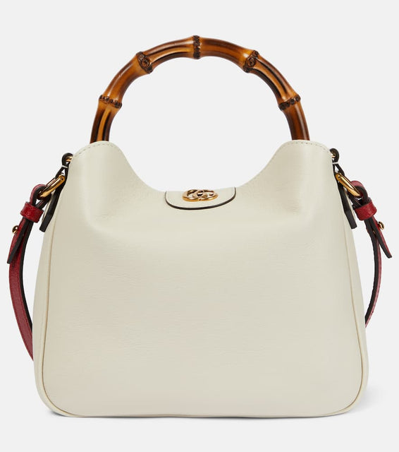 Gucci Gucci Diana Small leather shoulder bag. Shop Gucci Top-Handle Bags for women now.