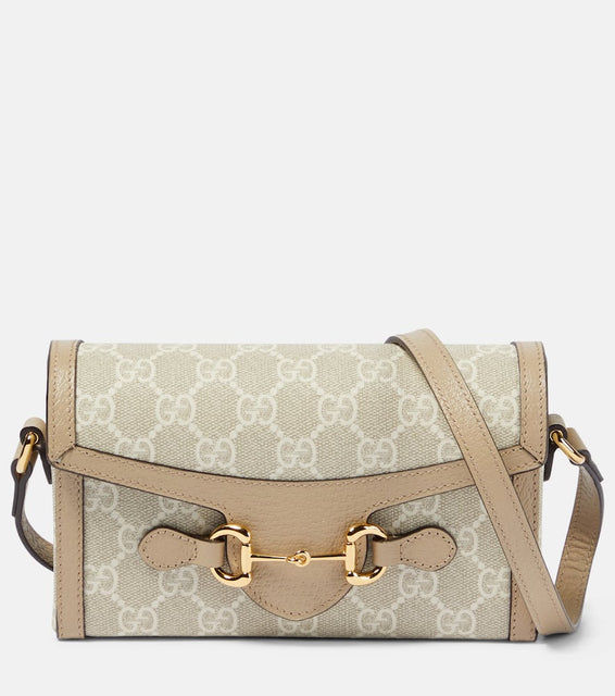 Gucci Gucci Horsebit 1955 GG Mini crossbody bag. Shop Gucci Shoulder Bags for women now.