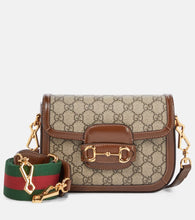 Gucci Gucci Horsebit 1955 Mini leather-trimmed shoulder bag. Shop Gucci Shoulder Bags for women now.