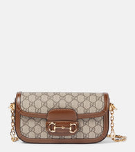 Gucci Gucci Horsebit 1955 canvas shoulder bag. Shop Gucci Shoulder Bags for women now.