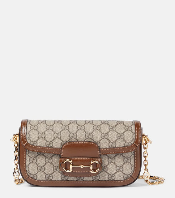 Gucci Gucci Horsebit 1955 canvas shoulder bag. Shop Gucci Shoulder Bags for women now.