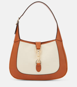 Gucci Gucci Jackie Small leather-trimmed shoulder bag. Shop Gucci Shoulder Bags for women now.