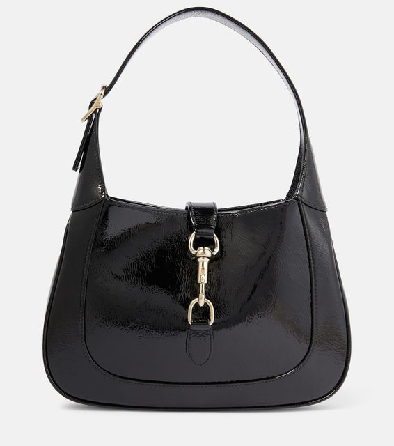 Gucci Gucci Jackie Small patent leather shoulder bag. Shop Gucci Shoulder Bags for women now.