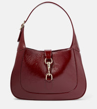 Gucci Gucci Jackie Small patent leather shoulder bag. Shop Gucci Shoulder Bags for women now.