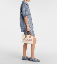 Gucci Mini logo leather-trimmed canvas tote bag