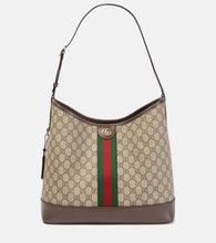 Gucci Ophidia GG Medium canvas shoulder bag. Shop Gucci Shoulder Bags for women now.