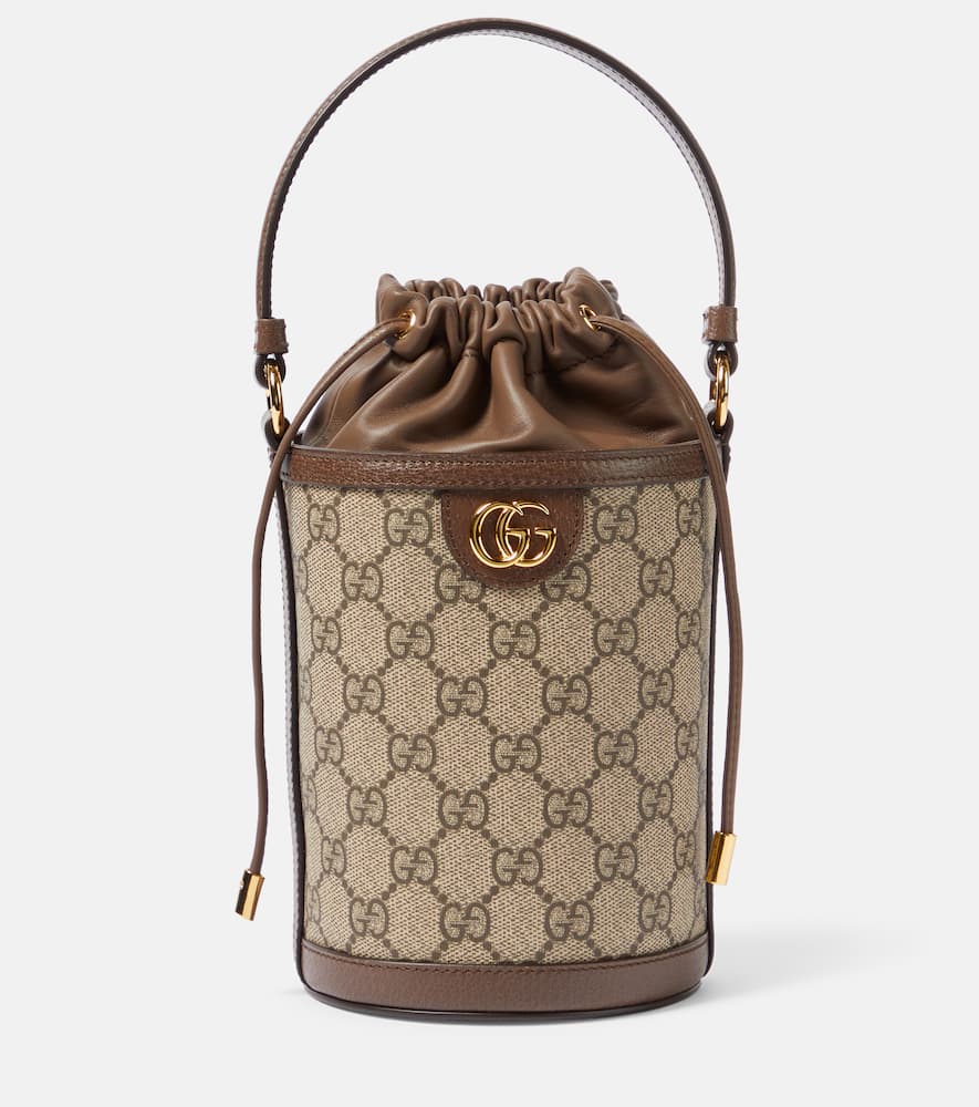 Gucci Ophidia GG Mini canvas bucket bag. Shop Gucci Shoulder Bags for women now.