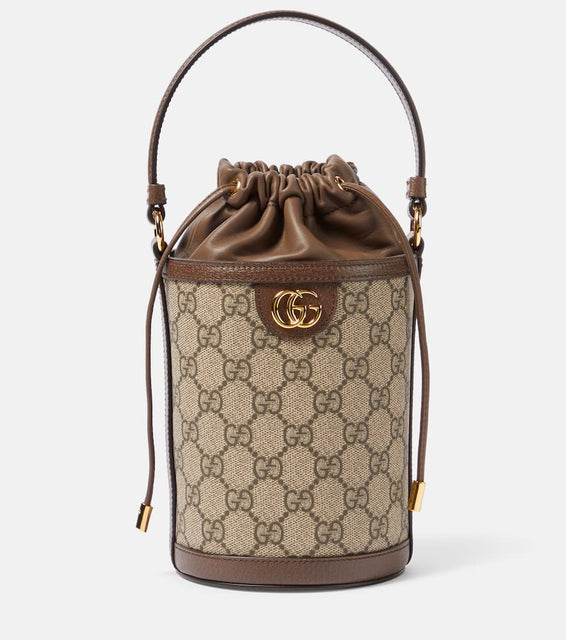 Gucci Ophidia GG Mini canvas bucket bag. Shop Gucci Shoulder Bags for women now.