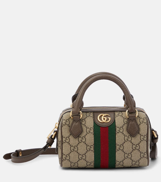 Gucci Ophidia Mini GG canvas crossbody bag. Shop Gucci Shoulder Bags for women now.