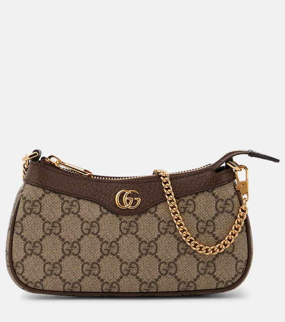 Gucci Ophidia Mini GG canvas shoulder bag. Shop Gucci Shoulder Bags for women now.