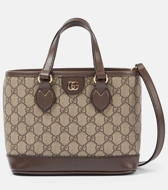 Gucci Ophidia Mini leather-trimmed tote bag. Shop Gucci Top-Handle Bags for women now.