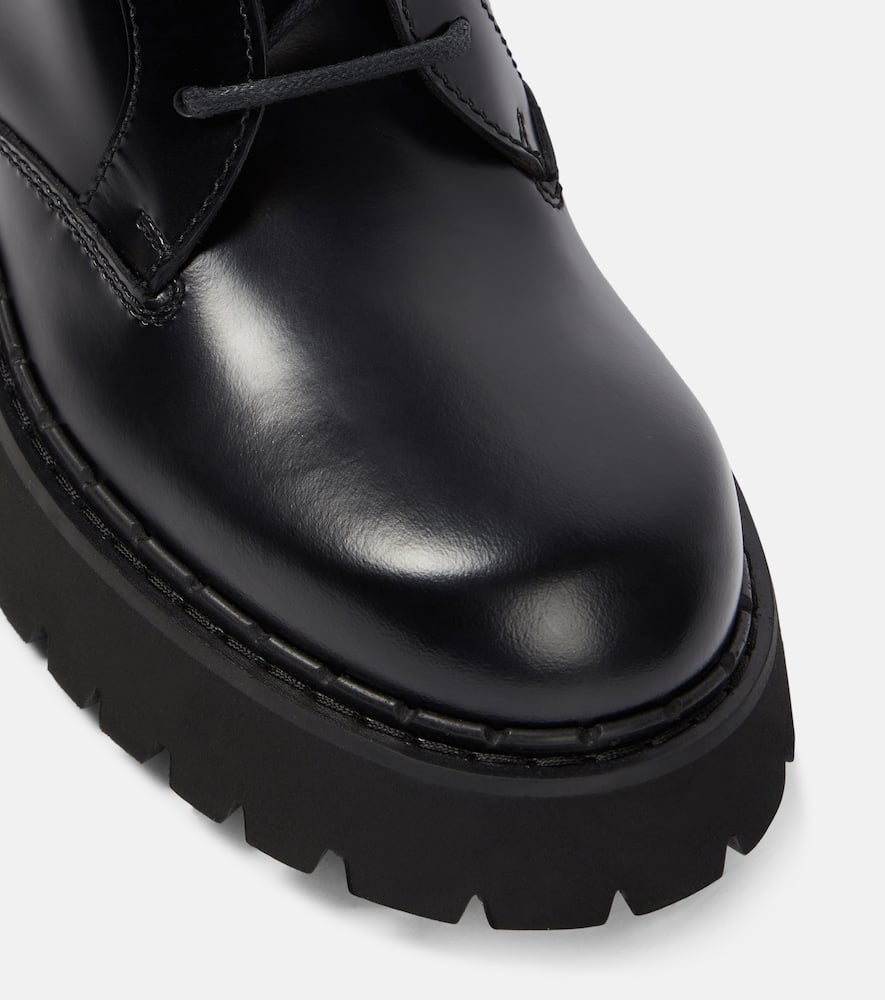 Gucci Polished leather combat boots