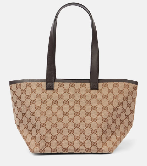 Gucci Totissima Small leather-trimmed tote bag. Shop Gucci Tote Bags for women now.