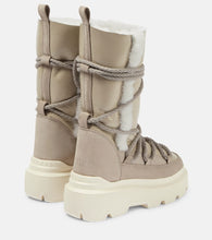 Inuikii Leather shearling-trimmed snow boots