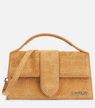 Jacquemus Bambino Large suede crossbody bag. Shop Jacquemus Top-Handle Bags for women now.