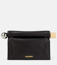 Jacquemus La Pochette Rond Carr√É¬© leather clutch. Shop Jacquemus Clutches for women now.