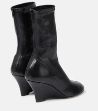 Khaite Apollo wedge leather ankle boots