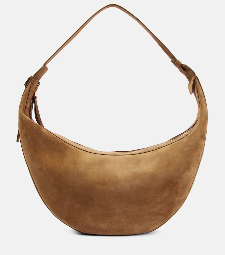 Khaite Augustina suede shoulder bag. Shop Khaite Shoulder Bags for women now.