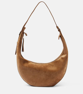 Khaite Augustina suede shoulder bag. Shop Khaite Shoulder Bags for women now.