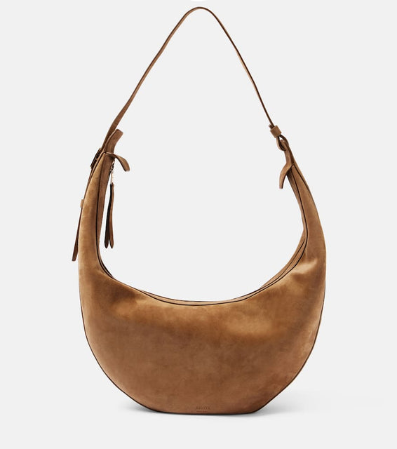 Khaite Augustina suede shoulder bag. Shop Khaite Shoulder Bags for women now.
