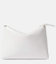 Khaite Lina patent leather shoulder bag. Shop Khaite Clutches for women now.